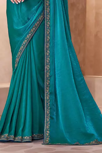 Teal satin georgette embroidered saree with unstitched blouse piece