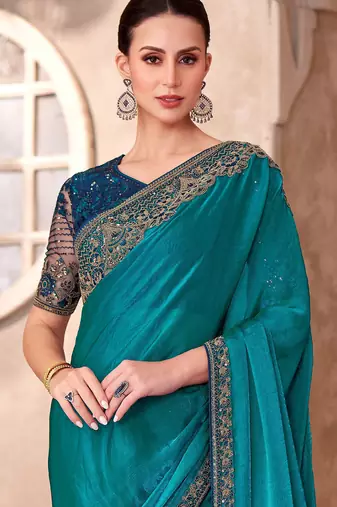 Teal satin georgette embroidered saree with unstitched blouse piece