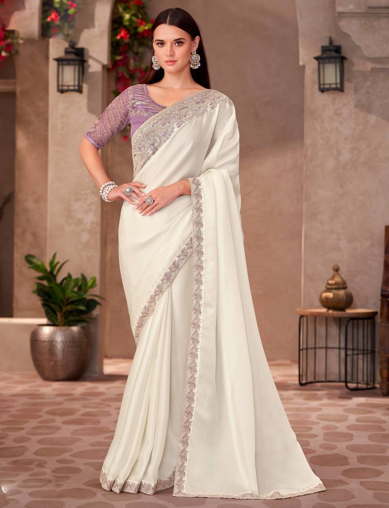 Off white georgette embroidered saree with unstitched blouse piece