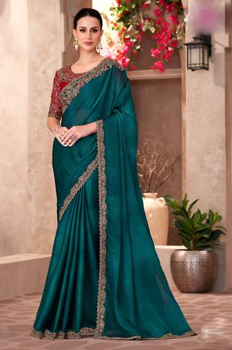 Dark teal chiffon embroidered saree with unstitched blouse piece