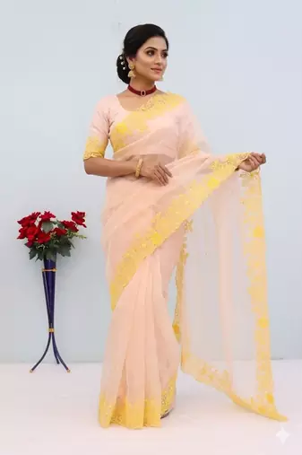 peach emboidered cut work organza saree with blouse