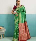 Green banarasi art silk blend zari woven saree with unstitched blouse piece