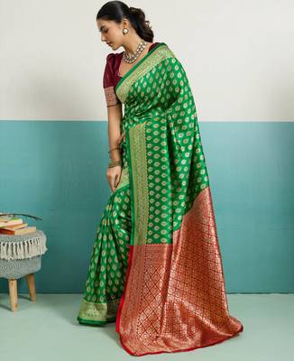 Green banarasi silk blend zari woven saree with unstitched blouse piece 2