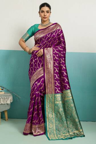 Wine banarasi art silk blend zari woven saree with unstitched blouse piece