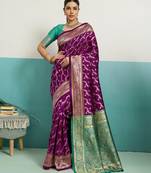 Wine banarasi art silk blend zari woven saree with unstitched blouse piece