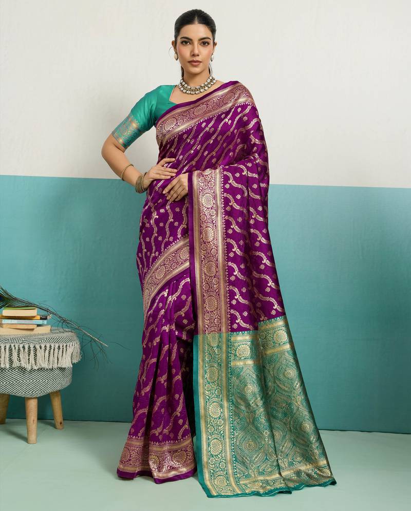 Wine banarasi art silk blend zari woven saree with unstitched blouse piece
