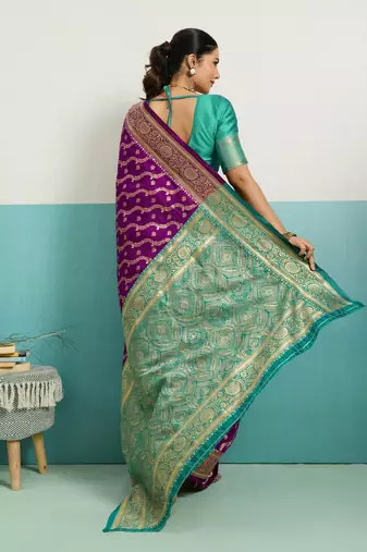 Wine banarasi art silk blend zari woven saree with unstitched blouse piece
