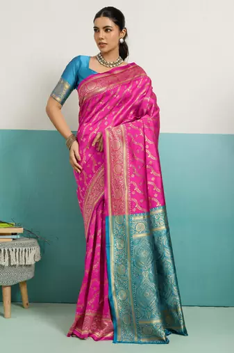 Magenta banarasi art silk blend zari woven saree with unstitched blouse piece