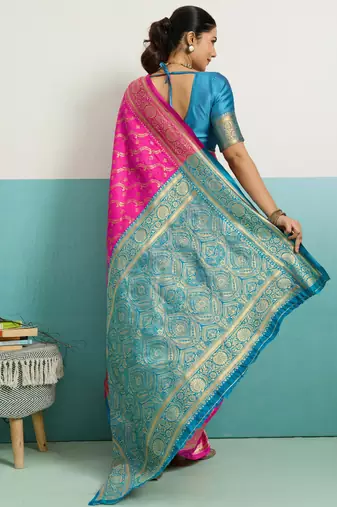 Magenta banarasi art silk blend zari woven saree with unstitched blouse piece