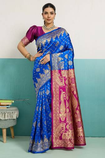 Blue banarasi art silk blend zari woven saree with unstitched blouse piece