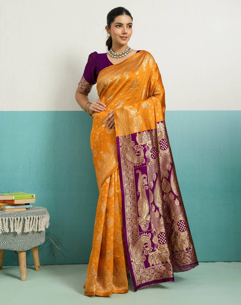 Mustard banarasi art silk blend zari woven saree with unstitched blouse piece