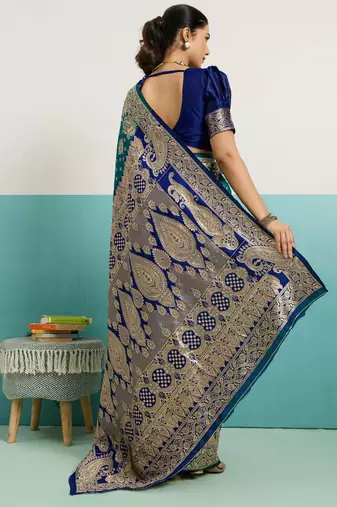 Teal banarasi art silk blend zari woven saree with unstitched blouse piece