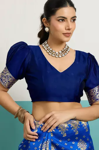 Teal banarasi art silk blend zari woven saree with unstitched blouse piece