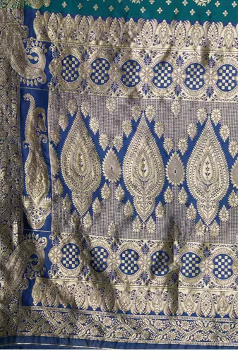 Teal banarasi art silk blend zari woven saree with unstitched blouse piece