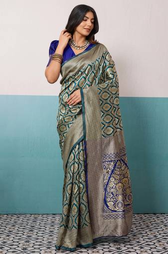 Teal banarasi art silk blend zari woven saree with unstitched blouse piece