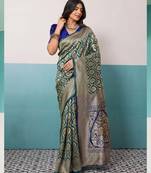 Teal banarasi art silk blend zari woven saree with unstitched blouse piece