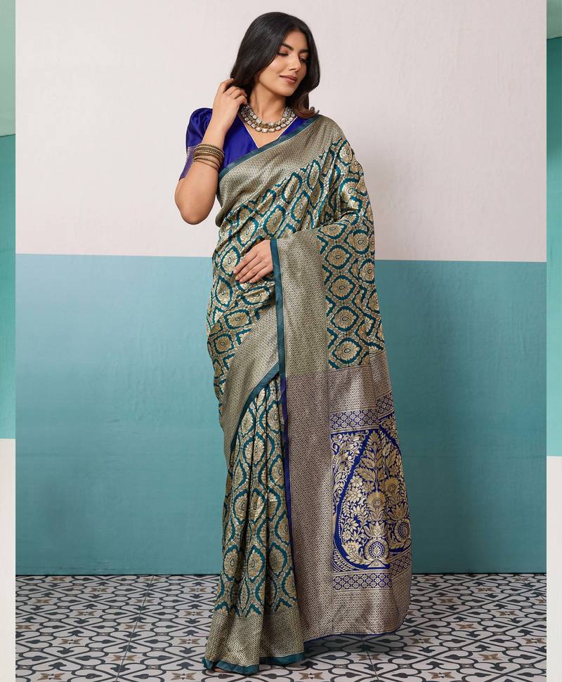 Teal banarasi art silk blend zari woven saree with unstitched blouse piece