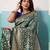 Teal banarasi art silk blend zari woven saree with unstitched blouse piece