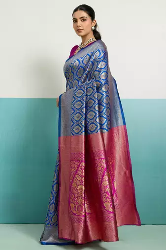 Magenta banarasi art silk blend zari woven saree with unstitched blouse piece