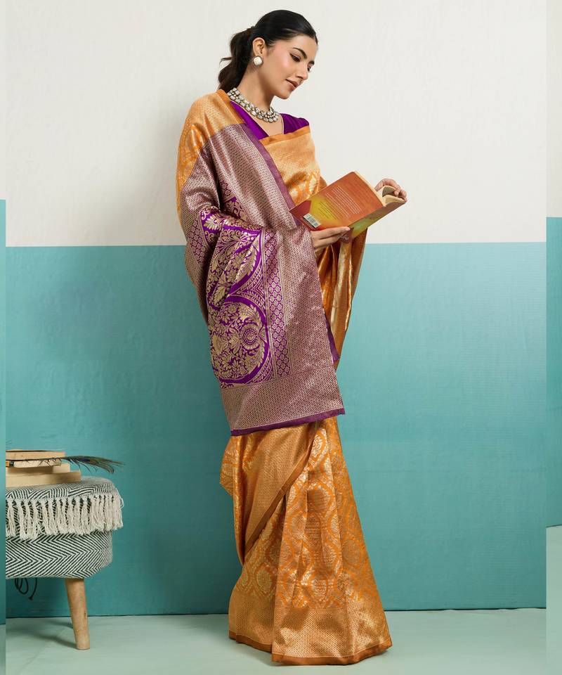 Mustard banarasi art silk blend zari woven saree with unstitched blouse piece