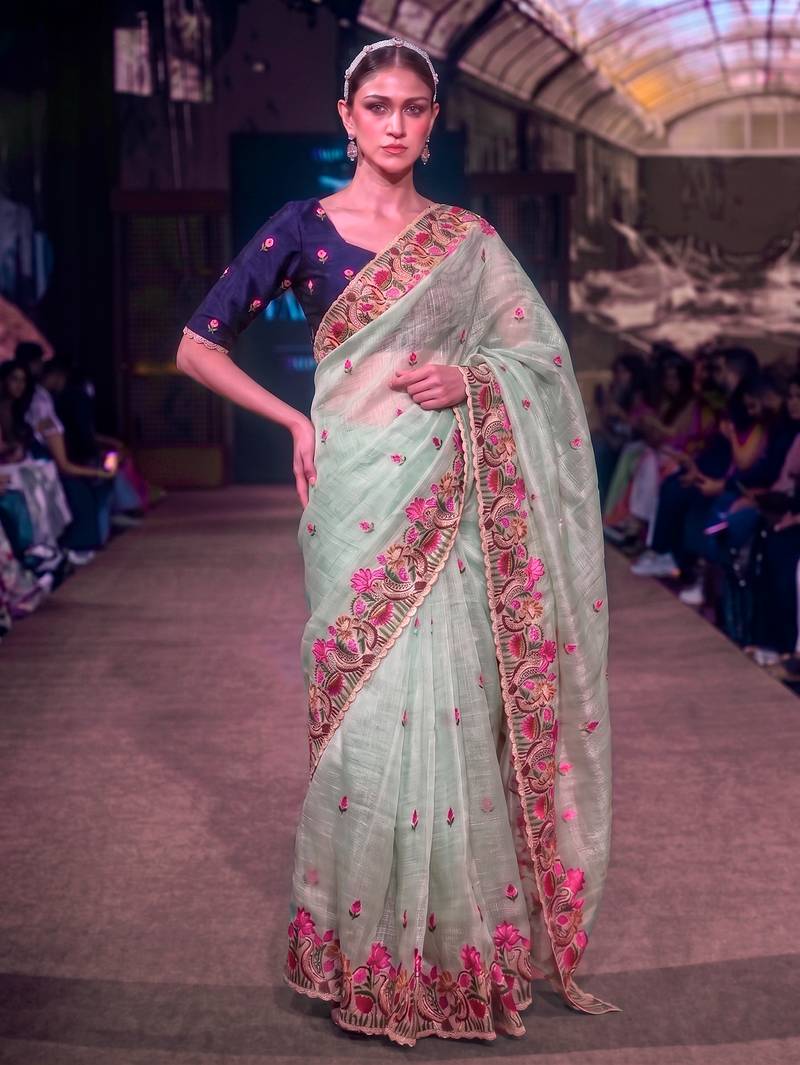 Women's kota tissue saree elegant threadwork & zari border detail