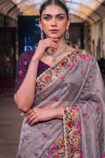 Women's kota tissue saree elegant threadwork & zari border detail
