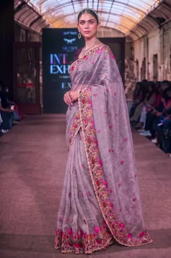 Women's kota tissue saree elegant threadwork & zari border detail