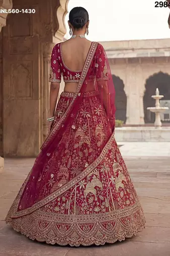 rani pink silk embroidered lehenga set