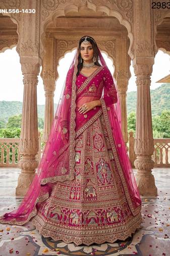 rani pink silk embroidered Lehenga set