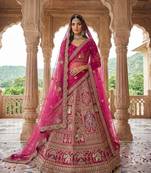 rani pink silk embroidered Lehenga set