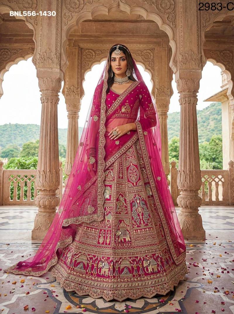 rani pink silk embroidered Lehenga set
