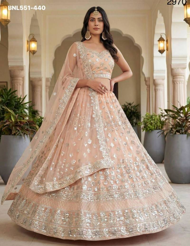 light peach net embroidered Lehenga set