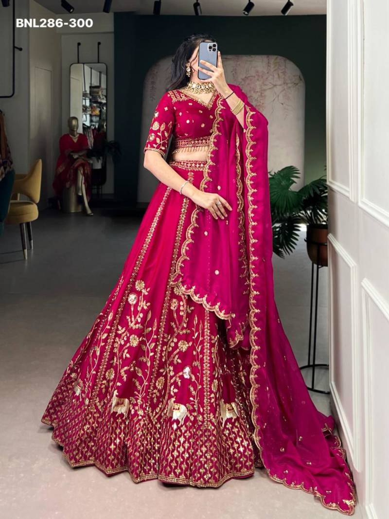 dark rani pink silk embroidered Lehenga set