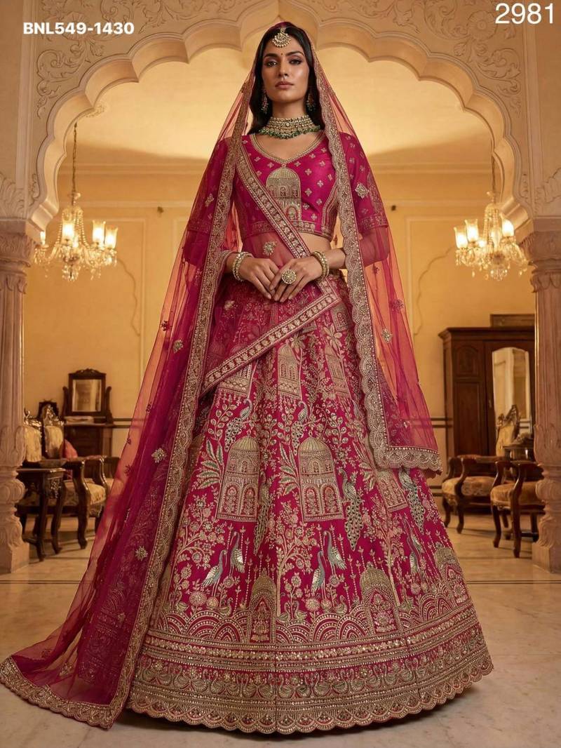 rani pink silk embroidered Lehenga set