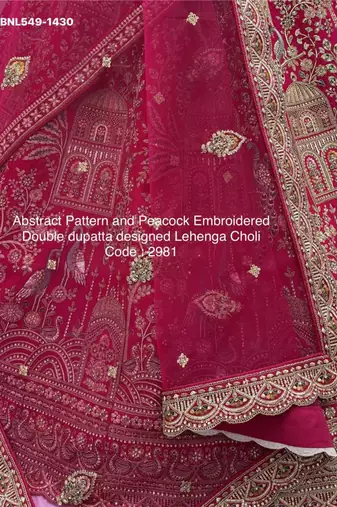 rani pink silk embroidered Lehenga set