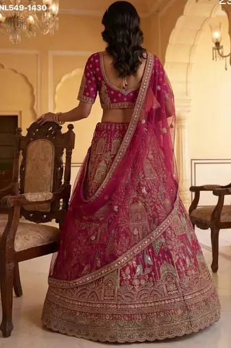 rani pink silk embroidered Lehenga set