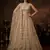 beige net embroidered Lehenga set