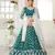 teal green net embroidered Lehenga set
