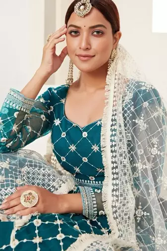 teal green net embroidered Lehenga set