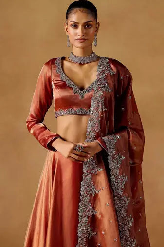 rust sequins zari embroidered jimmy choo designer semi stitched lehenga choli
