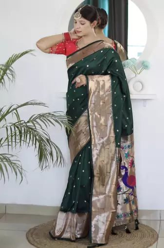 dark green art silk woven saree with blouse