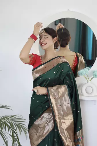 dark green art silk woven saree with blouse