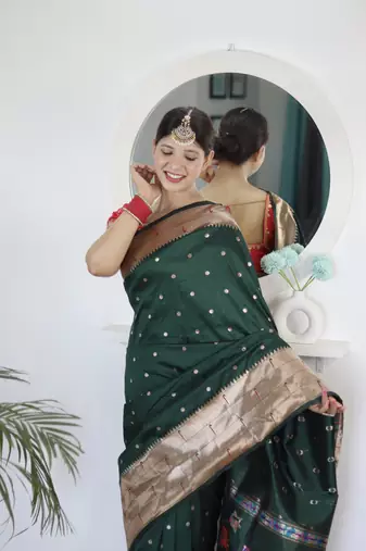 dark green art silk woven saree with blouse