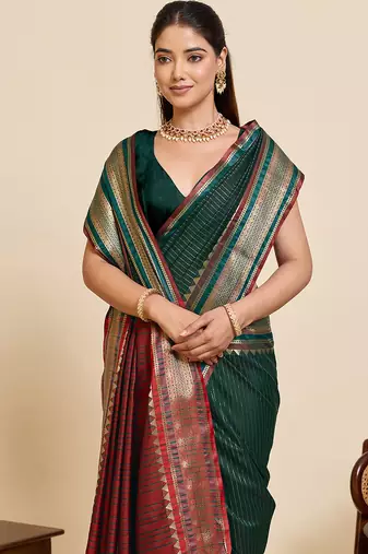 dark green art silk woven saree with blouse
