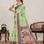 green linen printed saree with blouse