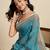 turquoise linen printed saree with blouse