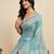 turquoise linen printed saree with blouse