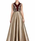 Golden silk sleevless embroidered gown