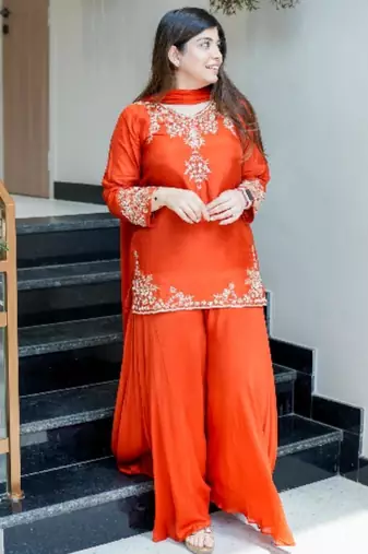 orange embroidered crepe sharara suit set with dupatta