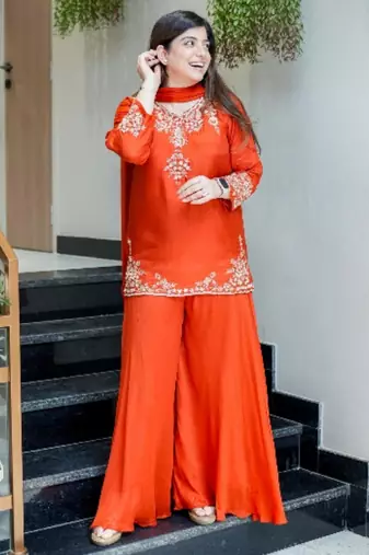 orange embroidered crepe sharara suit set with dupatta